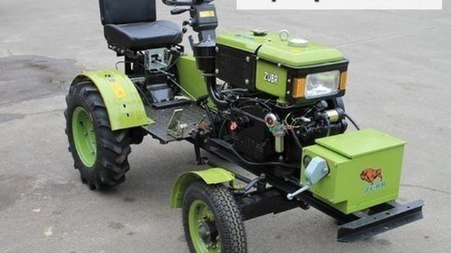 Мини-трактор Зубр модели 12Е: идеальный вариант для маленьких хозяйств